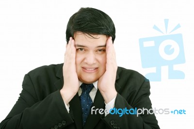 Businessman Suffering From Headache Stock Photo