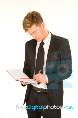 Businessman Taking Notes Stock Photo