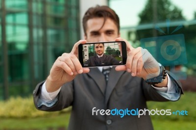 Businessman Taking Selfie Stock Photo