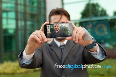 Businessman Taking Selfie Stock Photo