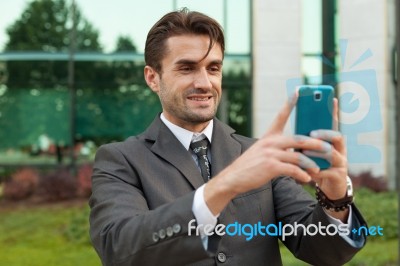 Businessman Taking Selfie Stock Photo