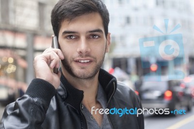 Businessman Talking On His Mobile Phone Stock Photo