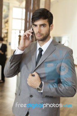 Businessman Talking On The Phone Stock Photo