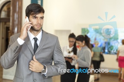 Businessman Talking On The Phone Stock Photo