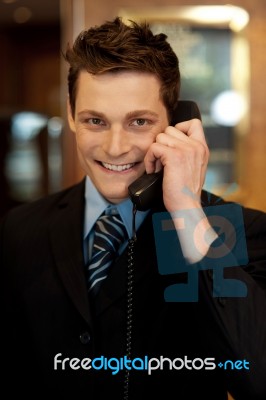 Businessman Talking Over Phone Stock Photo