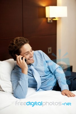 Businessman Talking Over Phone Stock Photo