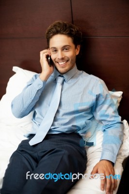 Businessman Talking Over Phone Stock Photo