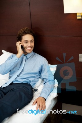 Businessman Talking Over Phone Stock Photo