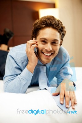 Businessman Talking Over Phone Stock Photo