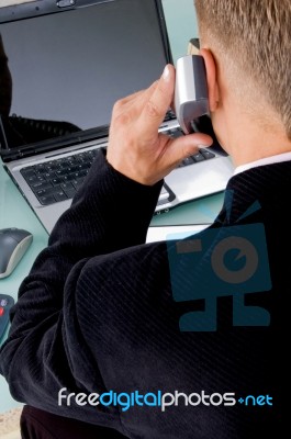 Businessman Talking Over Phone Stock Photo