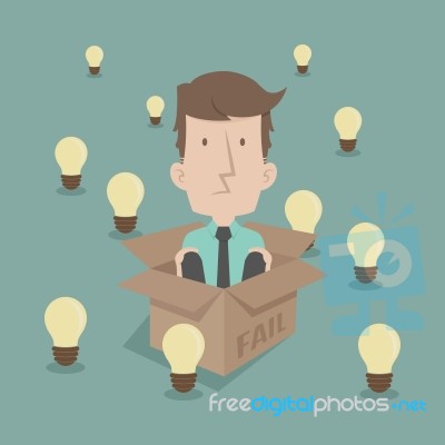 Businessman Thinking Inside The Box Stock Image