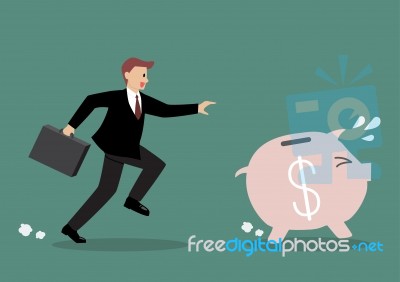 Businessman Try To Catch Piggy Bank Stock Image