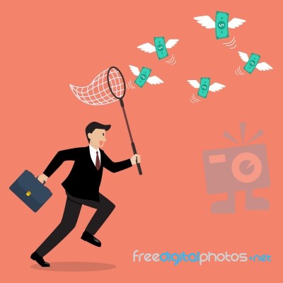 Businessman Trying To Catch Money Stock Image