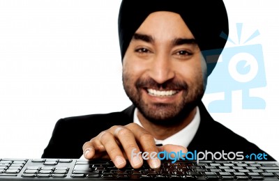 Businessman Typing On Keyboard Stock Photo