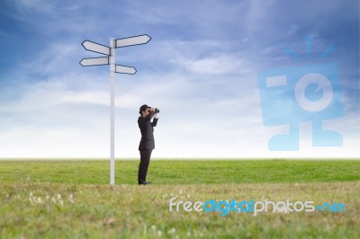 Businessman Using Binoculars Stock Photo