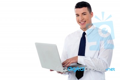 Businessman Using Laptop Stock Photo