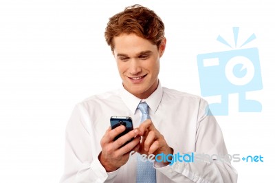 Businessman Using Mobile Phone Stock Photo