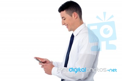 Businessman Using Mobile Phone Stock Photo