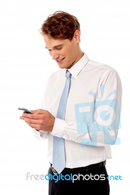 Businessman Using Mobile Phone Stock Photo