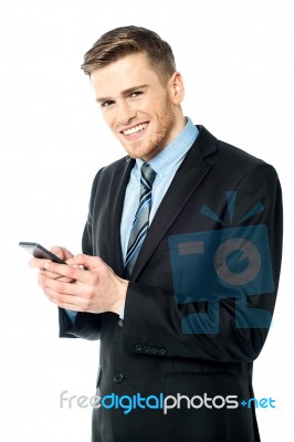 Businessman Using Mobile Phone Stock Photo