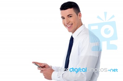 Businessman Using Mobile Phone Stock Photo