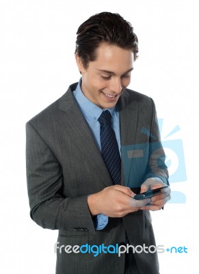 Businessman Using Phone Stock Photo