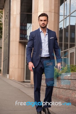 Businessman Walking Stock Photo