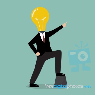 Businessman With A Light Bulb Head Pointing Up Stock Image