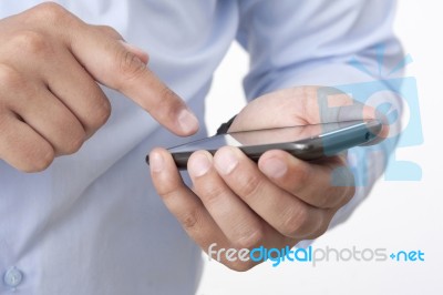 Businessman With A Mobile Phone Stock Photo