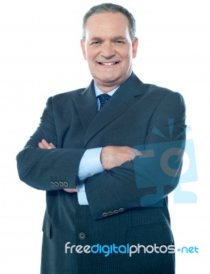 Businessman with arm crossed Stock Photo