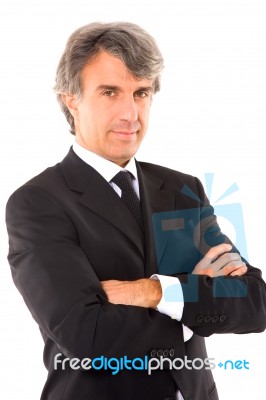 Businessman With Arms Crossed Stock Photo