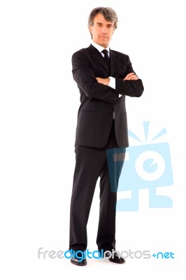 Businessman With Arms Crossed Stock Photo