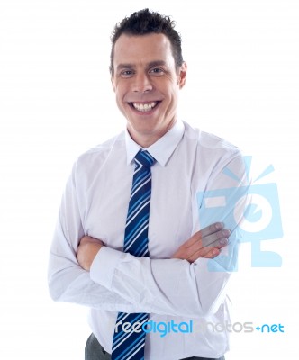 Businessman with Arms Crossed Stock Photo