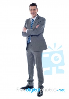 Businessman With Arms Crossed Stock Photo