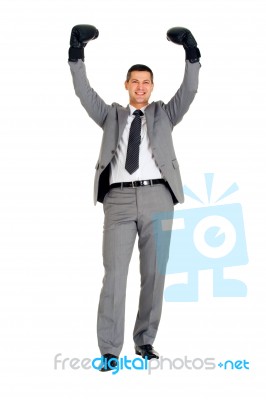 Businessman With Boxing Gloves Stock Photo