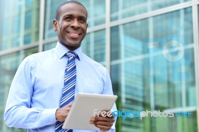 Businessman With Digital Tablet Stock Photo