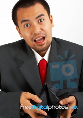 Businessman With Empty Wallet Stock Photo