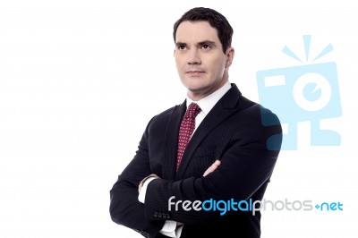 Businessman With Folded Arms Stock Photo