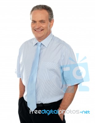 Businessman With Hands In Pocket Stock Photo