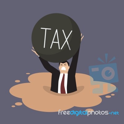 Businessman With Heavy Tax Sinking In A Quicksand Stock Image