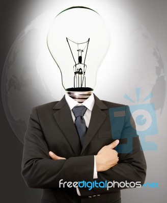 Businessman With Lamp Head Stock Photo