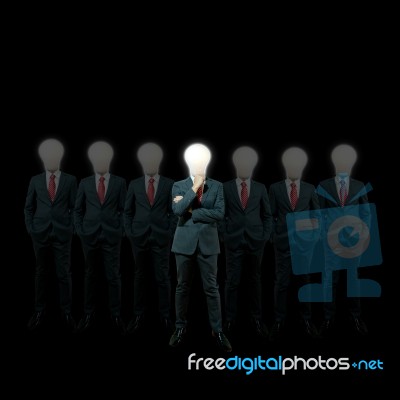 Businessman With Lamp Head Stock Image