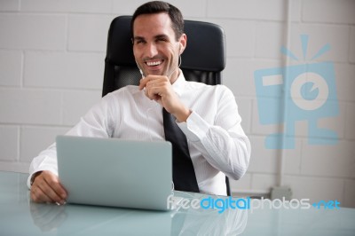 Businessman With Laptop Stock Photo