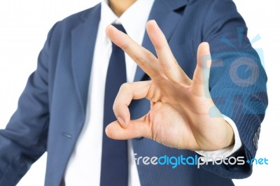 Businessman With Ok Sign Hand Gesture Isolated Stock Photo