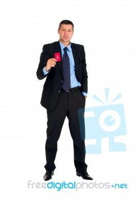 Businessman With Red Card Stock Photo