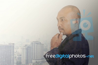 Businessman With The Cityscape Stock Photo