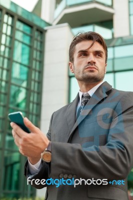 Businessman With The Smart Phone Stock Photo