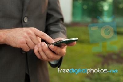 Businessman With The Smart Phone Stock Photo