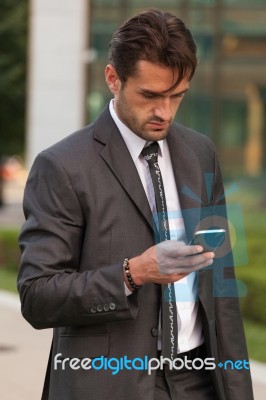 Businessman With The Smart Phone Stock Photo