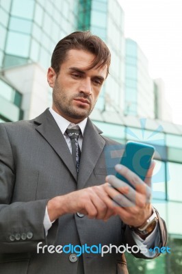 Businessman With The Smart Phone Stock Photo